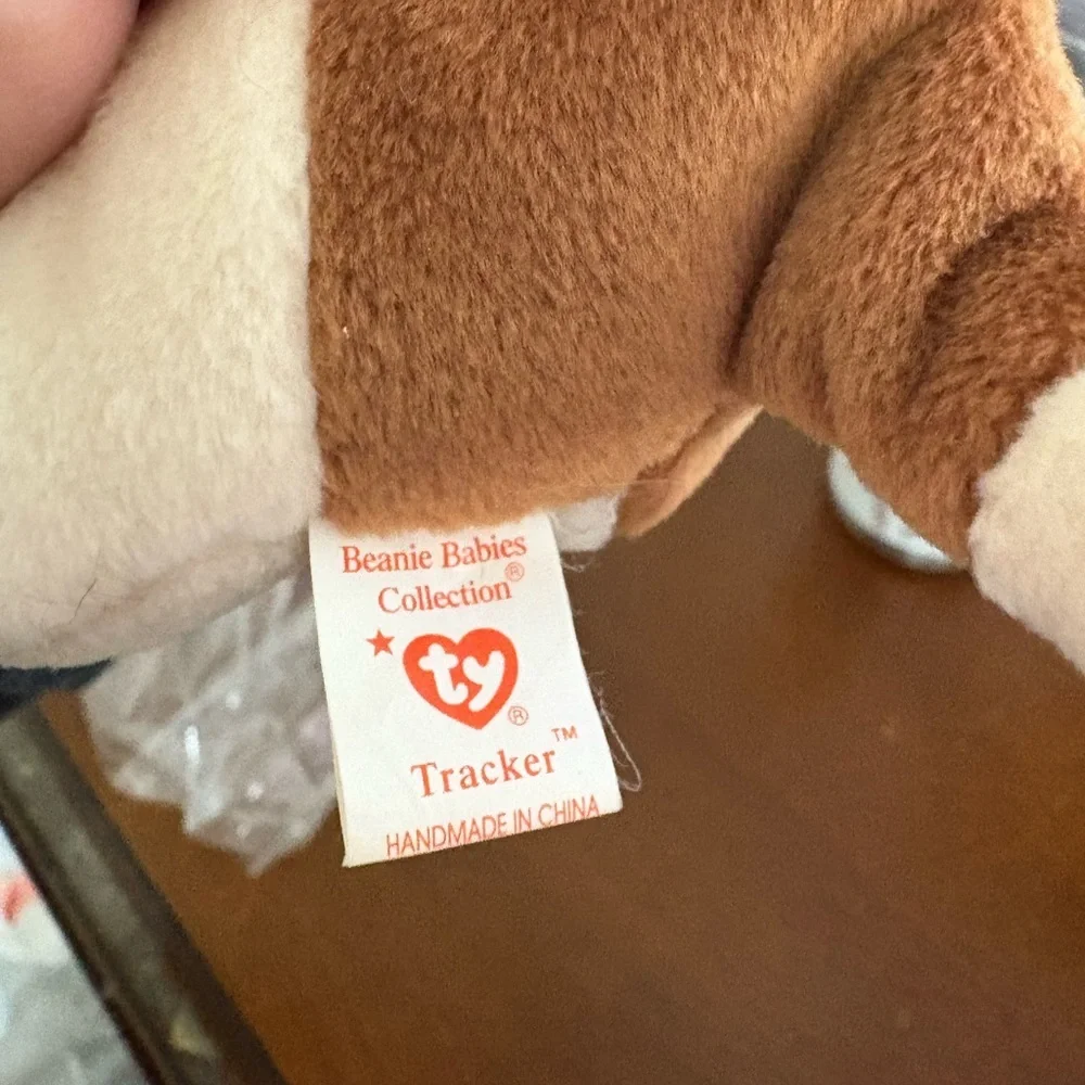 Collectors item: TAG ERRORD1997 Ty Tracker Beanie Baby, Rare, PE PELLETS. NWT.